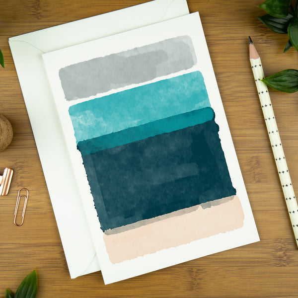 An abstract art colour block greeting card with shades of blue and pink.